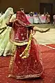 A Rajput woman performing ghoomar