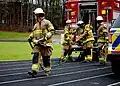 Raleigh firefighters prepare at the scene of an accident.