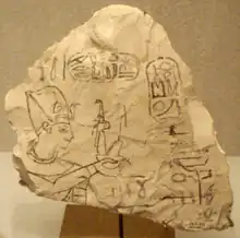 Limestone ostracon showing the incense pot with flame below the "god" hieroglyph-(a 'flag standard').