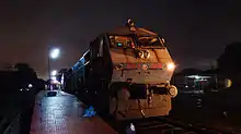 Train at a station at night