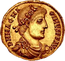 Golden coin depicting man with diadem facing right