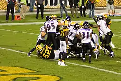 A game in 2008. For the Ravens, CB Fabian Washington is #31, and OLB/DE Jarret Johnson is #95. For the Steelers, WR Santonio Holmes is #10.