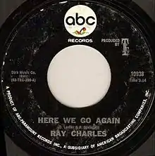 Black 45 record label with the ABC logo on top and the song "Here We Go Again", singer Ray Charles and other detail