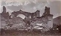 Iglesia de La Recolección in 1875. The only surviving arch was a symbol of Antigua Guatemala ruins for many years.