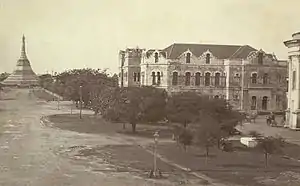 Image 11Recorder's Court on Sule Pagoda Road, with the Sule Pagoda at the far end, Rangoon, 1868. Photographer: J. Jackson. (from History of Myanmar)