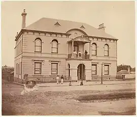 Town Hall in 1871, first Mayor George Renwick is standing on the balcony.