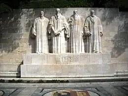 Image 3Statues of William Farel, John Calvin, Theodore Beza, and John Knox, the most influential theologians in developing the Reformed faith, at the Reformation Wall in Geneva (from Calvinism)