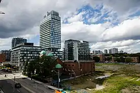 View of Regent Park undergoing redevelopment from Dundas Street (Sts. Cyril and Methody Macedonian-Bulgarian Church in the foreground).