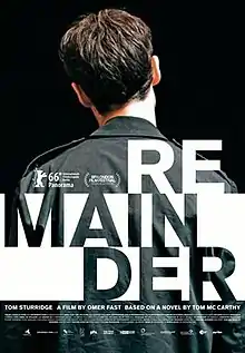 A poster featuring the back of a man's head.