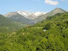 View of Ribnica and Tanuše villages with peaks and mountain pass of Korabska Vrata in background