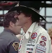 Richard Petty with a chevron moustache (side view)