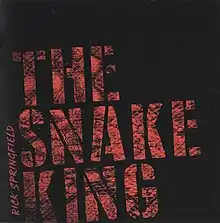 A black cover with the album name in red