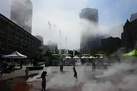 Children play in the Rings Fountain