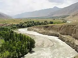 The Kokcha river flows around a bend