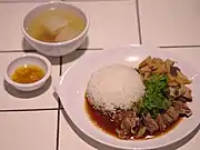 Roast goose curry served with rice at a restaurant in Thailand