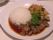 Roast goose curry served with rice at a restaurant in Thailand