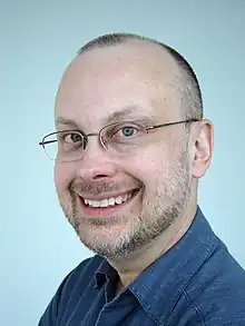 Portrait photograph of Sawyer smiling