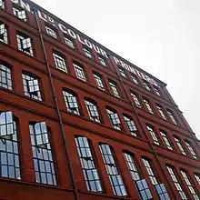 Photo of a red brick factory converted into housing