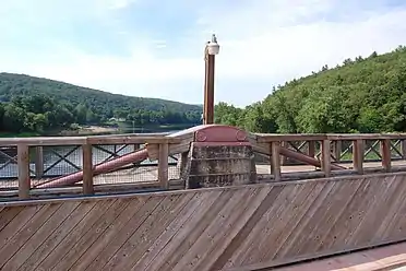 The visible cables of the suspension bridge