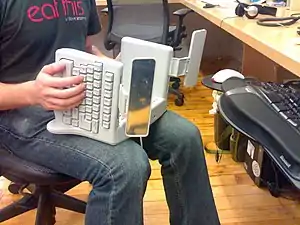 The SafeType keyboard is a fixed split keyboard with a 90° tenting angle