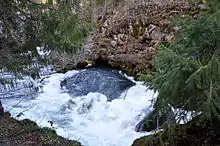 An upwelling of water is shown from where the Rogue River in Oregon re-emerges.