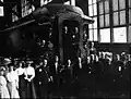 Photo of what appears to be the dedication of the chapel car St. Anthony.  It appears to have been taken at the Pullman factory where it was refitted.