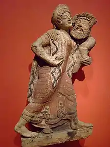 Roof ornament (antefix) in the shape of a dancing Maenad and a Satyr Etruscan 500–475 BCE Getty Villa
