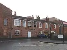 Water Lane and former Round Foundry buildings: No. 99 (left) considered the remains of the Green Sand foundry, built by Matthew Murray. No. 101 (centre) also believed to date from 1795 to 1802.