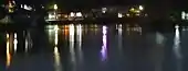 Reflections of the rowing clubs around the lake at night - 2