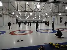 Curlers at play in a mixed receational league