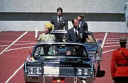 The Queen's Canadian Standard flying on her car, at the opening of the 1978 Commonwealth Games in Edmonton, Alberta