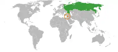  A grey world map with Russia and Syria highlighted