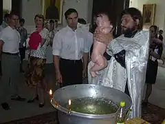 Baptism of an infant in the Russian Orthodox Church (St. Petersburg).