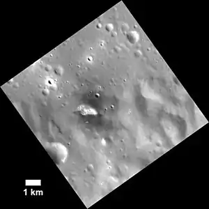 Hollow on the southern rim with halo of low reflectance material