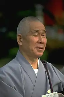 A priest from the Japanese Tendai school of Buddhism looking right