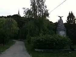 World War I memorial. Church tower in background.