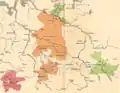 Saxony in 1180 with the Ascanian duchies in Saxony around 1235 (green).  The former stem Duchy of Saxony is in gold with the official electorate duchy of Saxe-Wittenberg in green in the South East. Also shown is Saxe-Lauenburg in North West and the Welf Duchies of Brunswick-Luneburg in orange.