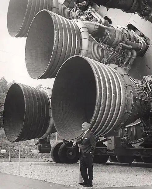 von Braun with the F-1 engines of the Saturn V first stage at the U.S. Space and Rocket Center