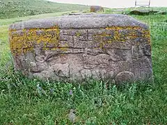 Medieval gravestone in front of the church