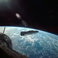 Rocket floating above Earth