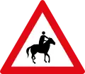 Horse riders ahead