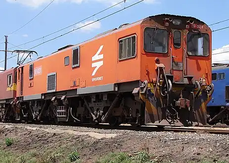 No. 10–021 in Spoornet orange livery at Pyramid South, Pretoria, 6 October 2009