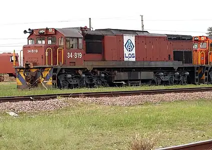 No. 34-819 in Spoornet maroon with NLPI Logistics emblems at Koedoespoort, 2 October 2009