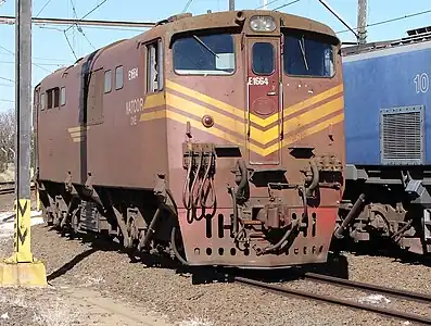 No. E1664 in SAR Gulf Red & whiskers at Beaconsfield, 17 September 2009