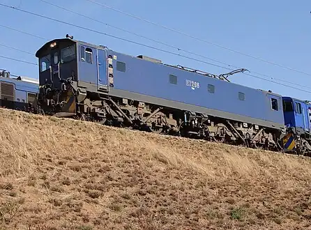 No. E7298 in Spoornet blue livery with outline numbers and inscribed 7E6 at Vryheid, KwaZulu-Natal, 15 August 2007