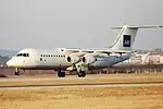 Small four-engined jetliner with high wings