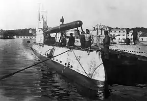 SM U-21 loads a torpedo during World War I.