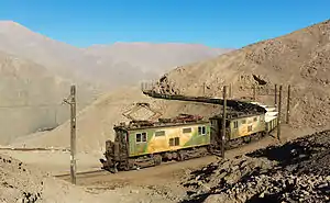 Locomotive hauling empty nitrate hoppers from Tocopilla to Barriles