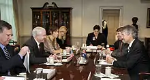 US Secretary of Defense Robert Gates (2nd from left, Debra Cagan to his left) hosts a Pentagon meeting with Stephen Smith (right) in the Pentagon on 28 January 2008