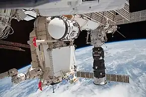 Canadarm2 attaches MRM-1 to the Zarya module.